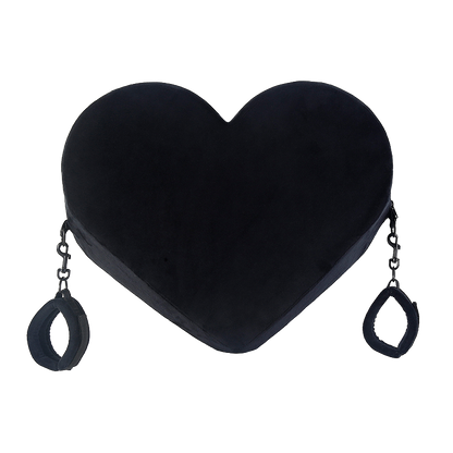 Black heart-shaped pillow with cuffs on both sides